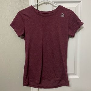 Reebok women’s workout tshirt. 52% polyester/ 48% cotton